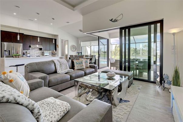 Dining room, Interior, Kitchen, Living room, Pendant Lights, Recessed Lighting, Stainless Steel Appliances, Wood Texture Flooring