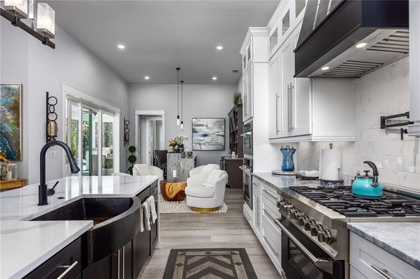 Dining room, Interior, Kitchen, Pendant Lights, Recessed Lighting, Stainless Steel Appliances, Wood Texture Flooring