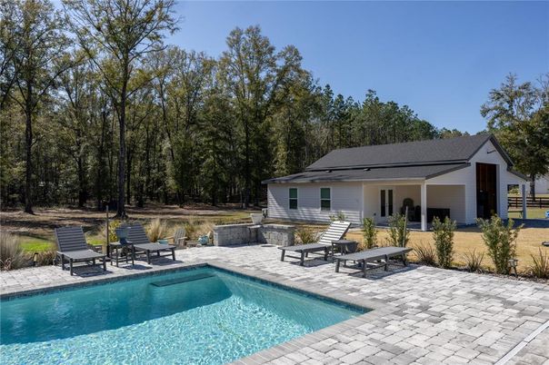 Exterior, Pool, Solar Panels