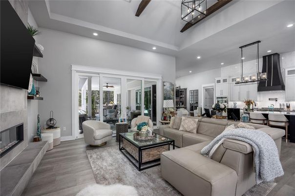 Chandelier, Dining room, Fireplace, Interior, Kitchen, Living room, Pendant Lights, Recessed Lighting, Wood Texture Flooring
