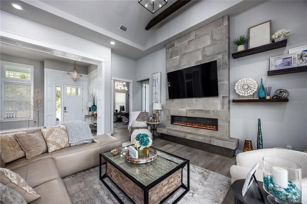 Fireplace, Interior, Living room, Pendant Lights, Recessed Lighting, Stone Walls, Wood Texture Flooring