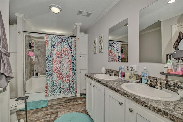Bathroom, Dual Sink Vanities, Glass Shower, Interior, Recessed Lighting, Wood Texture Flooring
