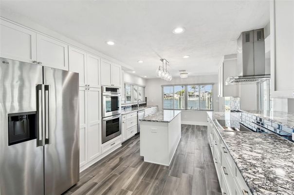 Chandelier, Interior, Kitchen, Recessed Lighting, Stainless Steel Appliances, Wood Texture Flooring