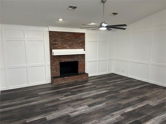 Empty room, Fireplace, Interior, Recessed Lighting, Stone Walls, Wood Texture Flooring