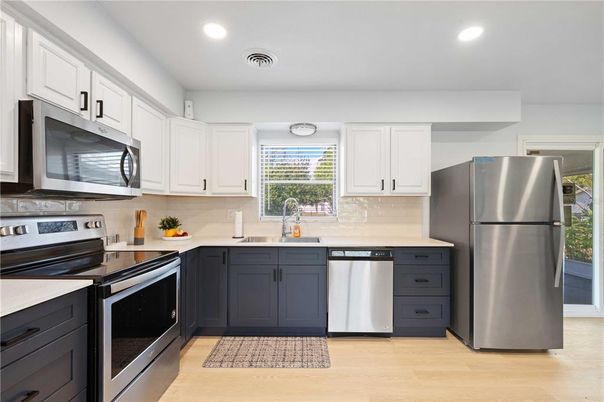 Interior, Kitchen, Recessed Lighting, Stainless Steel Appliances, Wood Texture Flooring