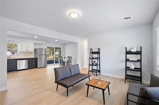 Dining room, Interior, Kitchen, Recessed Lighting, Stainless Steel Appliances, Wood Texture Flooring