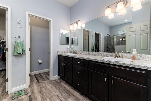 Bathroom, Dual Sink Vanities, Interior, Recessed Lighting, Wood Texture Flooring