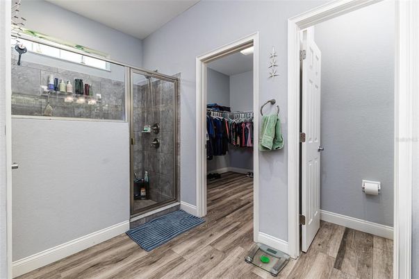 Bathroom, Glass Shower, Interior, Walk-in Closets, Wood Texture Flooring