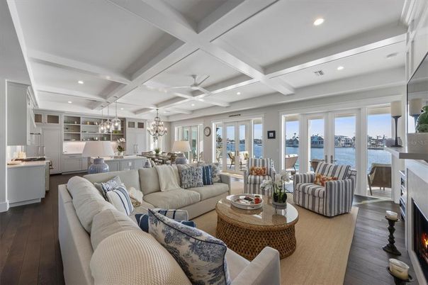 Chandelier, Dining room, Fireplace, Interior, Kitchen, Living room, Pendant Lights, Recessed Lighting, Water, Wood Texture Flooring