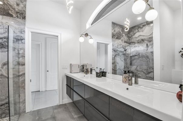 Bathroom, Dual Sink Vanities, Glass Shower, Interior, Marble Walls
