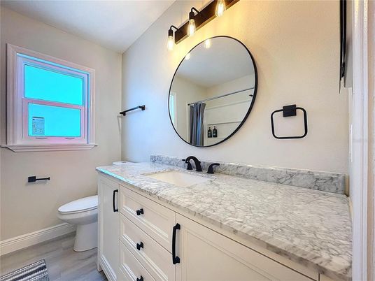 Bathroom, Dual Sink Vanities, Interior, Tile Countertops, Wood Texture Flooring