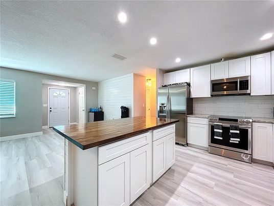 Interior, Kitchen, Recessed Lighting, Stainless Steel Appliances, Wood Texture Flooring