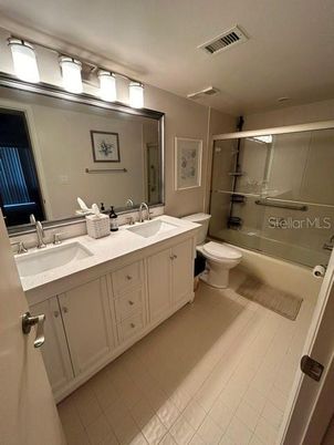 Bathroom, Dual Sink Vanities, Glass Shower, Interior, Wood Texture Flooring
