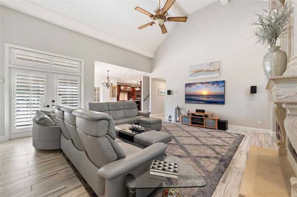 Chandelier, Fireplace, Interior, Living room, Recessed Lighting, Wood Texture Flooring