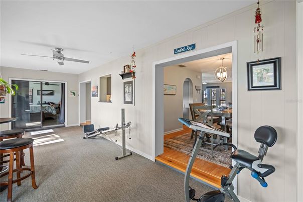 Dining room, Fitness Equipment, Interior, Pendant Lights, Wood Texture Flooring