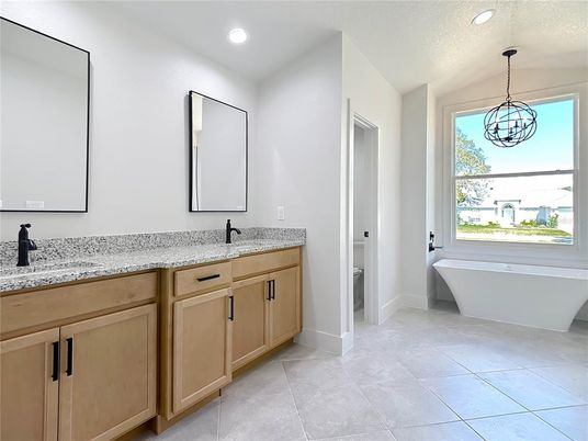 Bathroom, Dual Sink Vanities, Free Standing Baths, Interior, Pendant Lights, Recessed Lighting