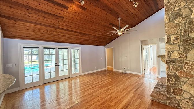 Empty room, Fireplace, Interior, Stone Walls, Wooden Ceilings, Wood Texture Flooring