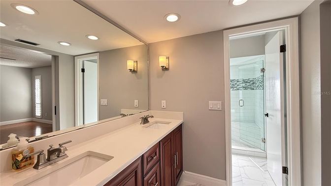 Bathroom, Dual Sink Vanities, Glass Shower, Interior, Marble, Recessed Lighting