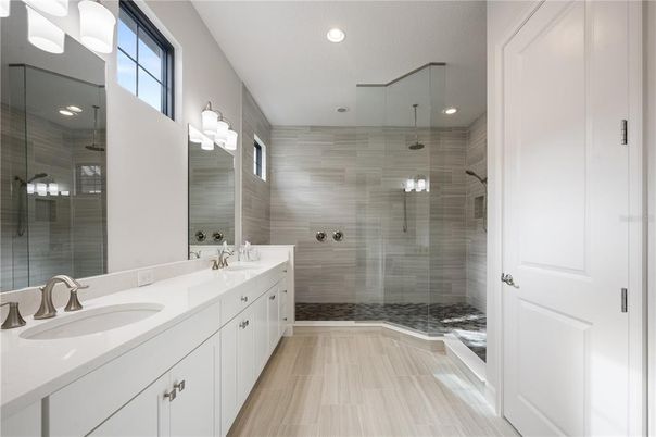 Bathroom, Dual Sink Vanities, Glass Shower, Interior, Recessed Lighting, Wood Texture Flooring