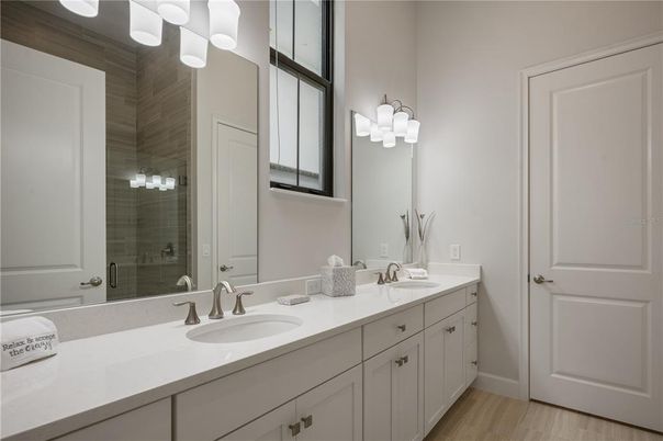 Bathroom, Dual Sink Vanities, Glass Shower, Interior, Wood Texture Flooring