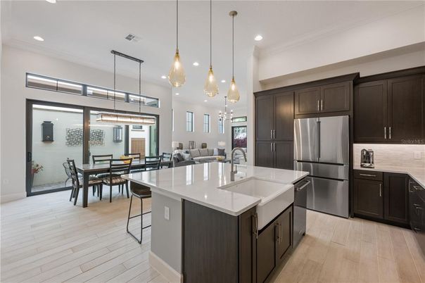 Dining room, Interior, Kitchen, Pendant Lights, Recessed Lighting, Stainless Steel Appliances, Wood Texture Flooring