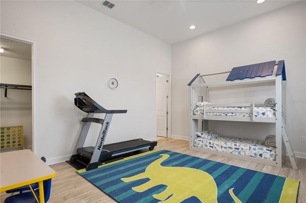 Bedroom, Fitness Equipment, Interior, Recessed Lighting, Wood Texture Flooring