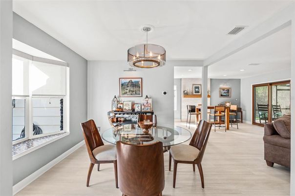 Chandelier, Dining room, Fireplace, Interior, Recessed Lighting, Wood Texture Flooring