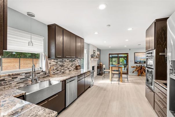 Dining room, Interior, Kitchen, Pendant Lights, Recessed Lighting, Stainless Steel Appliances, Wood Texture Flooring