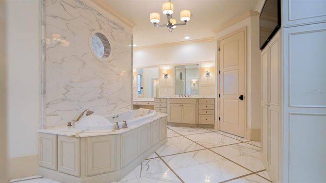 Bathroom, Chandelier, Dual Sink Vanities, Interior, Marble, Marble Walls, Recessed Lighting