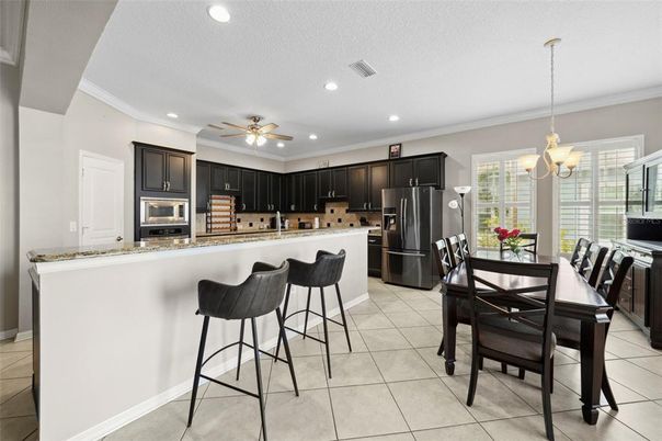 Chandelier, Dining room, Interior, Kitchen, Recessed Lighting, Stainless Steel Appliances