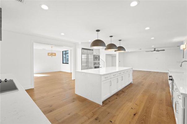 Interior, Kitchen, Pendant Lights, Recessed Lighting, Stainless Steel Appliances, Wood Texture Flooring