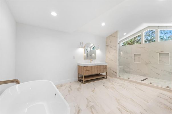 Bathroom, Dual Sink Vanities, Free Standing Baths, Glass Shower, Interior, Marble, Marble Walls, Recessed Lighting