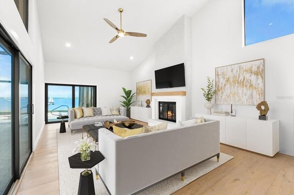Fireplace, Interior, Living room, Recessed Lighting, Water, Wood Texture Flooring