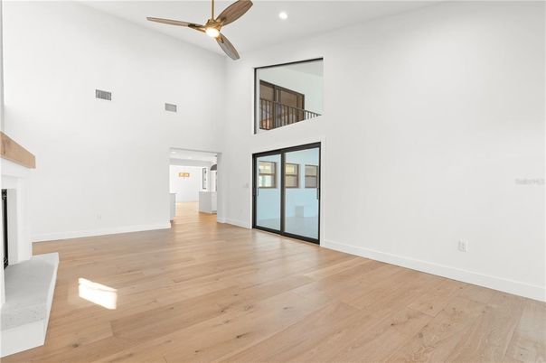 Empty room, Fireplace, Interior, Recessed Lighting, Wood Texture Flooring
