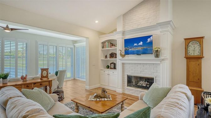 Fireplace, Interior, Living room, Recessed Lighting, Stone Walls, Wood Texture Flooring