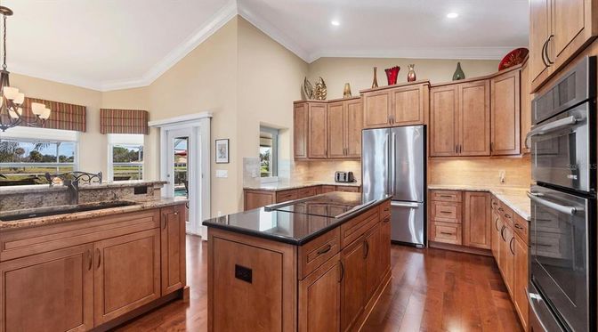 Chandelier, Interior, Kitchen, Pendant Lights, Recessed Lighting, Stainless Steel Appliances, Wood Texture Flooring