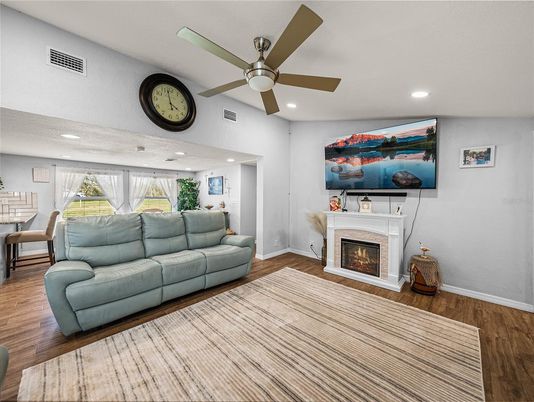 Fireplace, Interior, Living room, Recessed Lighting, Wood Texture Flooring