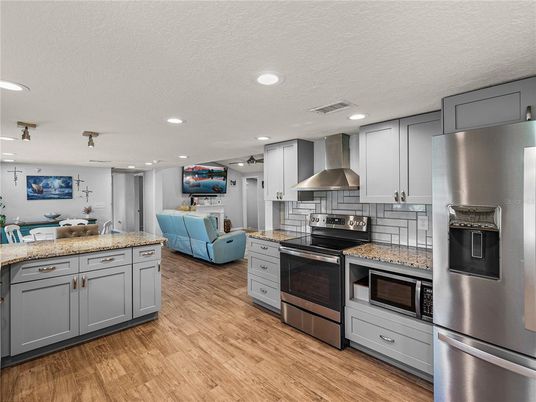 Interior, Kitchen, Recessed Lighting, Stainless Steel Appliances, Wood Texture Flooring