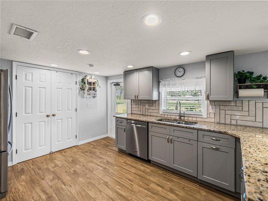 Interior, Kitchen, Recessed Lighting, Stainless Steel Appliances, Wood Texture Flooring