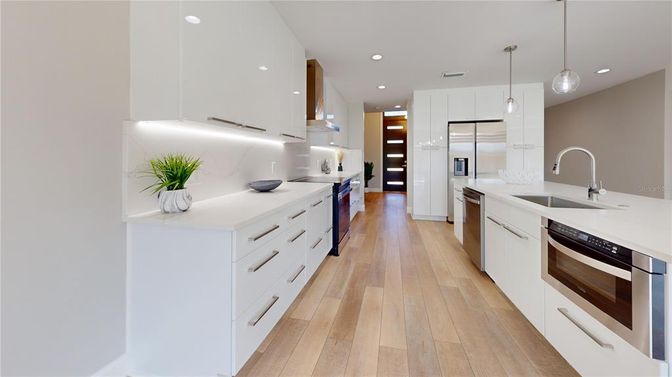 Interior, Kitchen, Pendant Lights, Recessed Lighting, Stainless Steel Appliances, Wood Texture Flooring