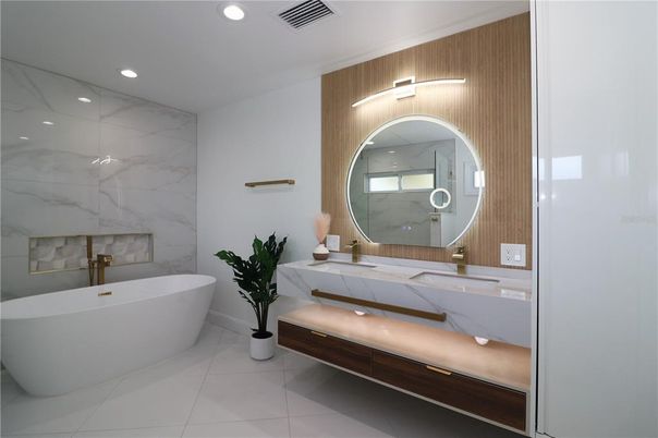 Bathroom, Dual Sink Vanities, Free Standing Baths, Interior, Marble Walls, Recessed Lighting