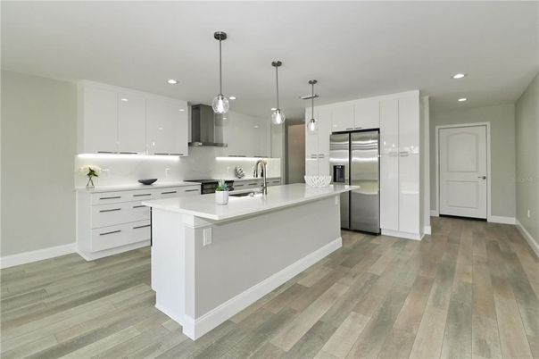 Interior, Kitchen, Pendant Lights, Recessed Lighting, Stainless Steel Appliances, Wood Texture Flooring