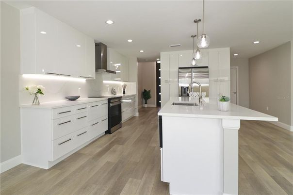Interior, Kitchen, Pendant Lights, Recessed Lighting, Stainless Steel Appliances, Wood Texture Flooring