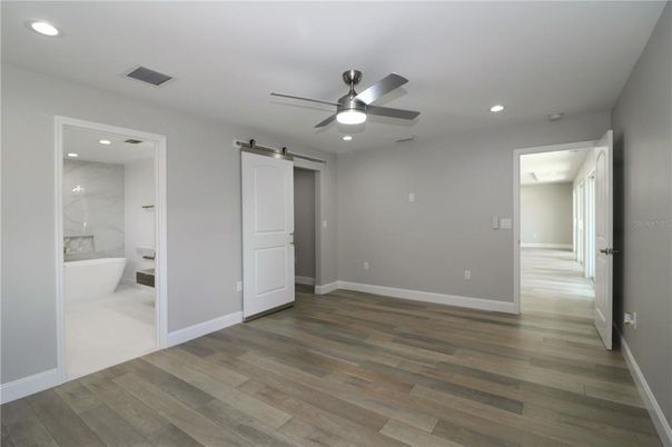 Bathroom, Empty room, Interior, Marble Walls, Recessed Lighting, Wood Texture Flooring
