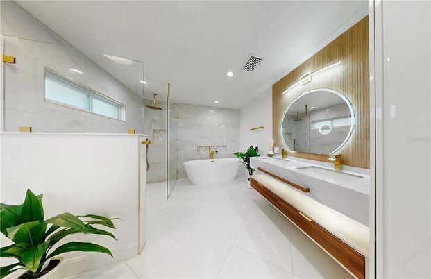 Bathroom, Dual Sink Vanities, Free Standing Baths, Glass Shower, Interior, Marble Walls, Recessed Lighting