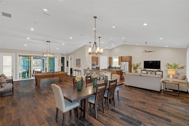 Billiard Table, Chandelier, Dining room, Game Room, Interior, Kitchen, Living room, Pendant Lights, Recessed Lighting, Wood Texture Flooring