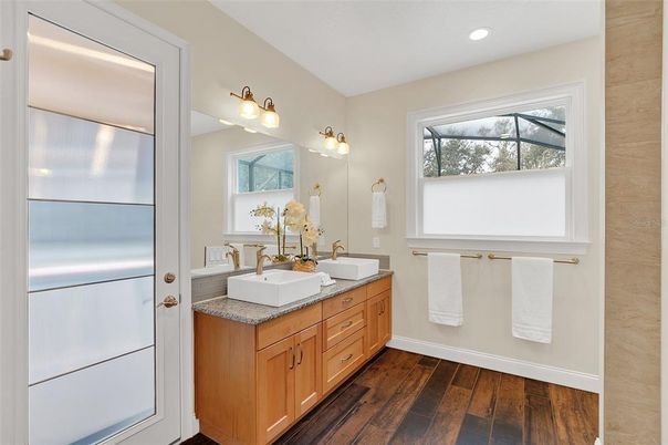 Bathroom, Dual Sink Vanities, Interior, Recessed Lighting, Wood Texture Flooring