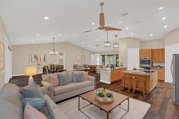 Chandelier, Dining room, Interior, Kitchen, Living room, Pendant Lights, Recessed Lighting, Stainless Steel Appliances, Wood Texture Flooring