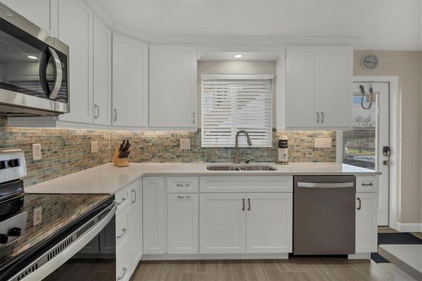 Interior, Kitchen, Recessed Lighting, Stainless Steel Appliances, Wood Texture Flooring