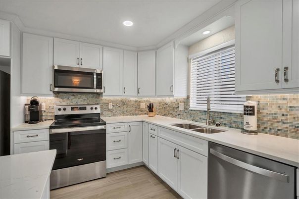 Interior, Kitchen, Recessed Lighting, Stainless Steel Appliances, Wood Texture Flooring